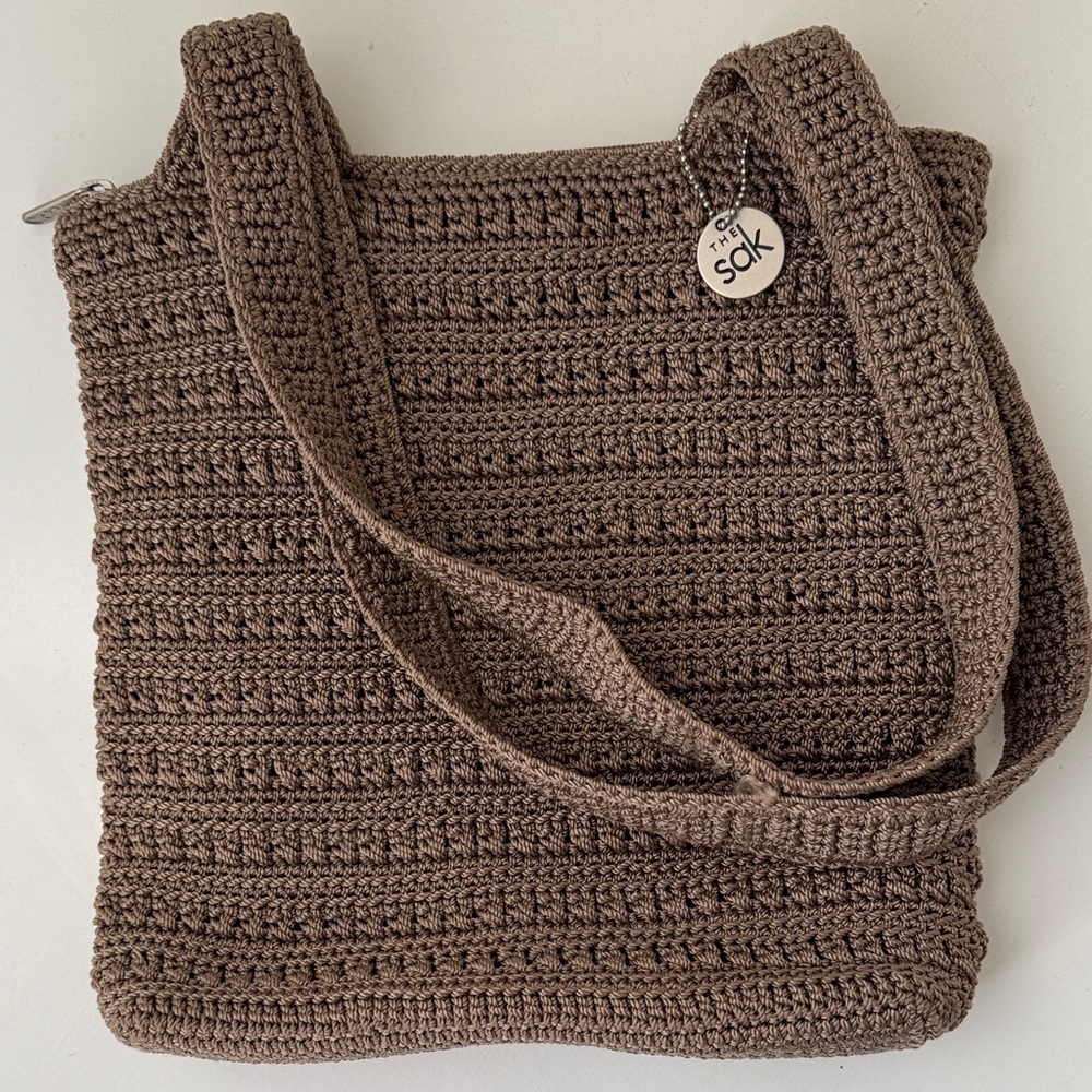 Le Sac Khaki crocheted zippered shoulder bag.